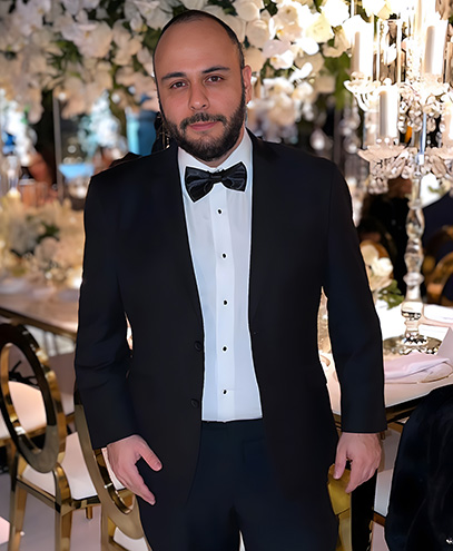 Kiarash Behain in formal attire